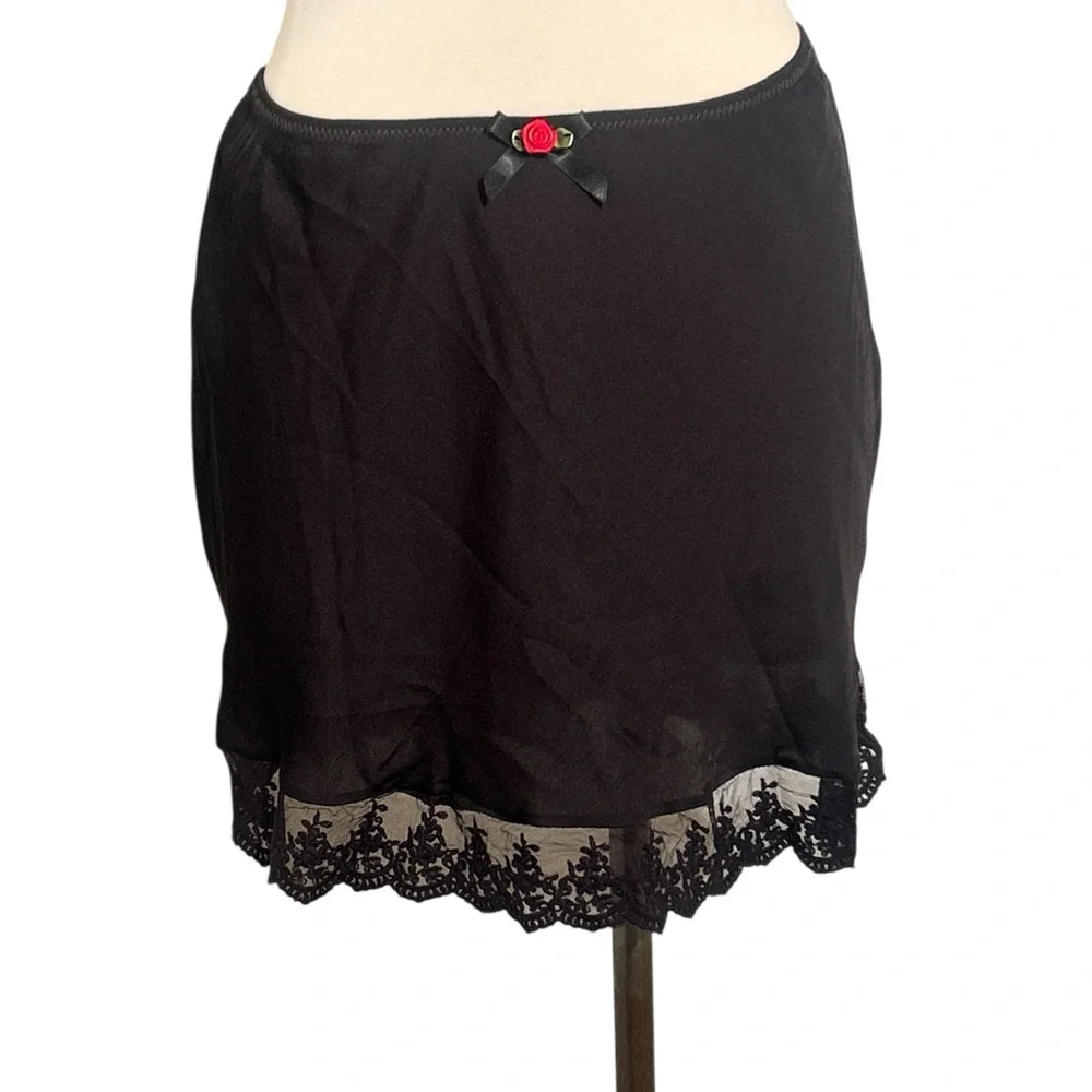 Urban Outfitters Black Mini Slip Skirt with Lace Hem and Red Rose Accent Size M